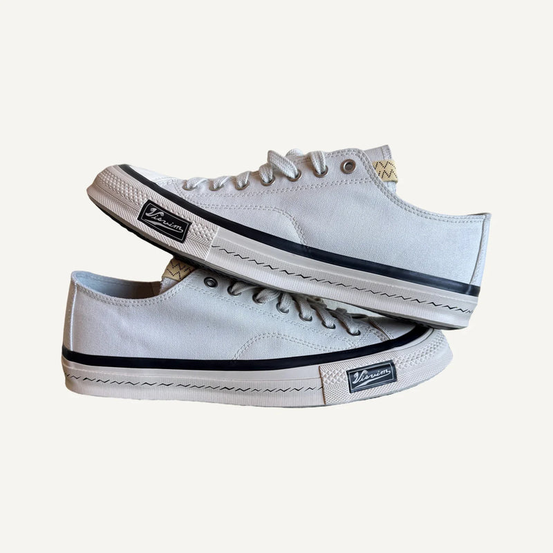 visvim Skagway Lo sneakers in ivory, pair stacked, side profile