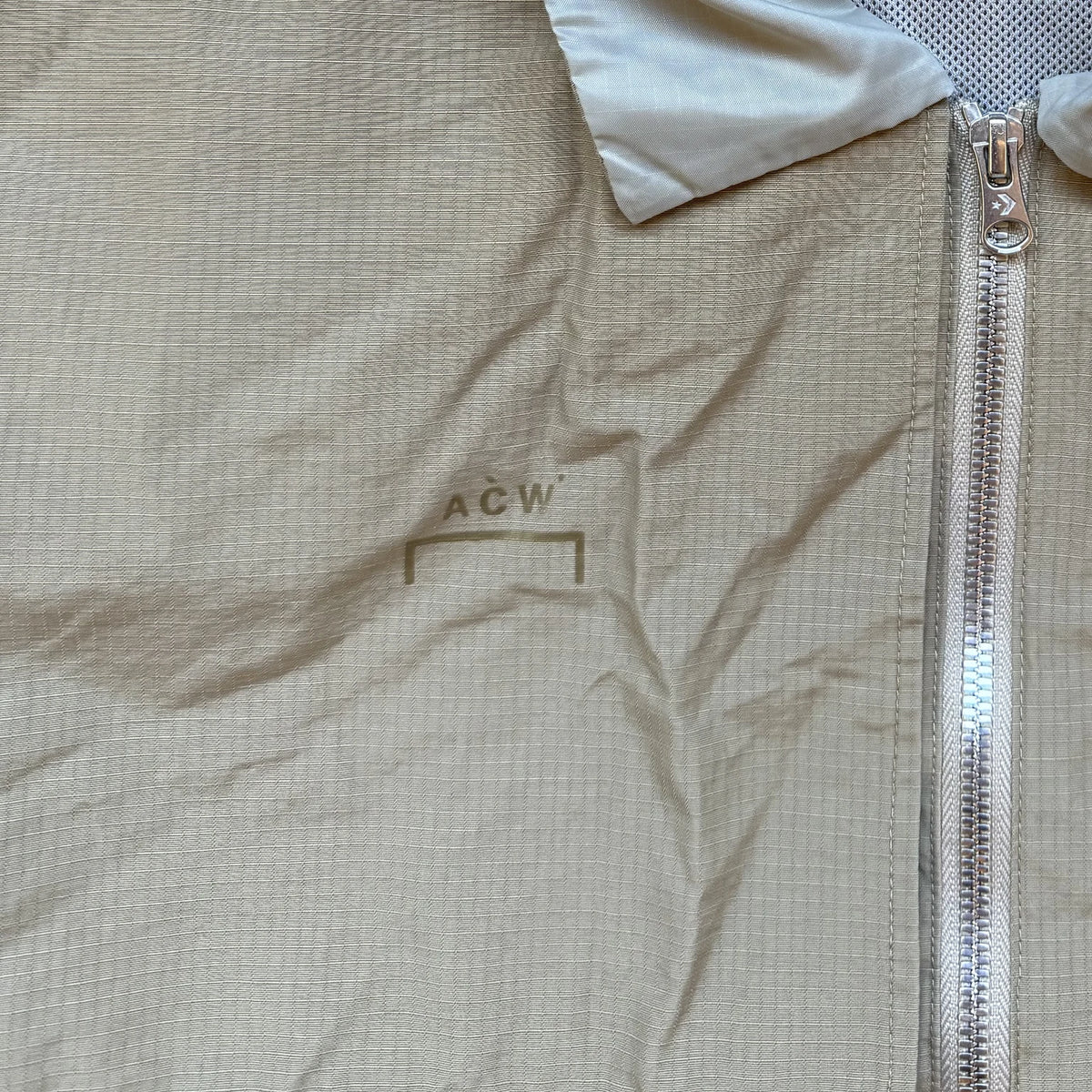 Converse x A-COLD-WALL* Coach Jacket, Khaki, image 3: A-COLD-WALL* logo on chest