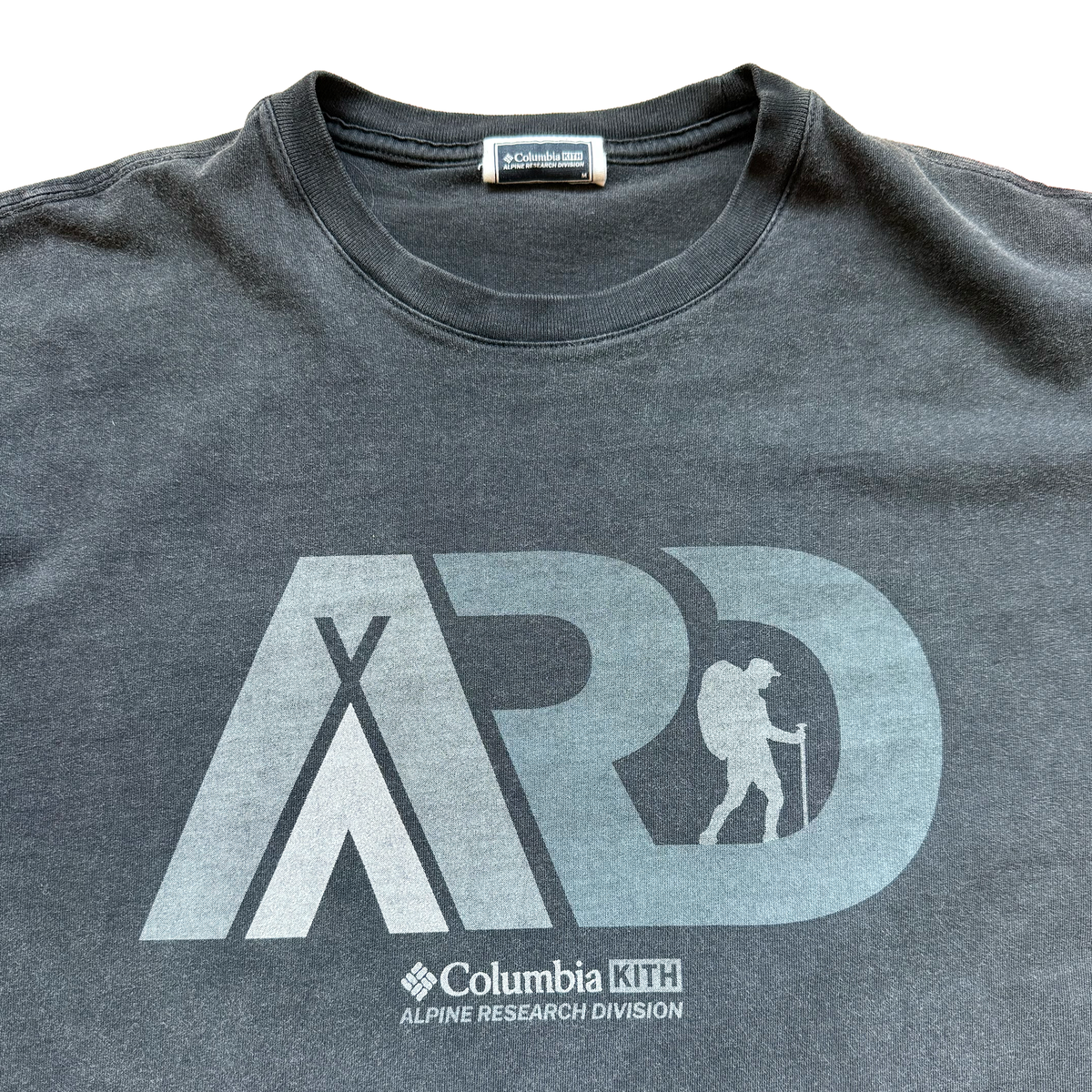 KITH x Columbia ARD tee, sleeve hem text